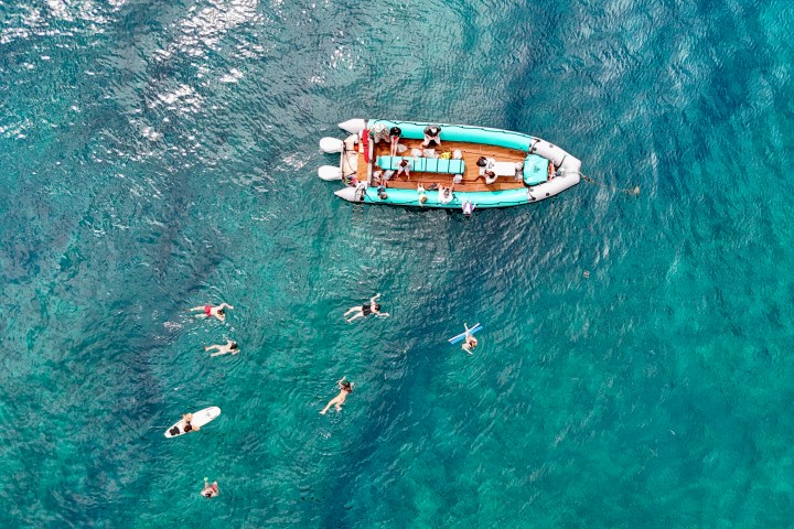 a small boat in a body of water