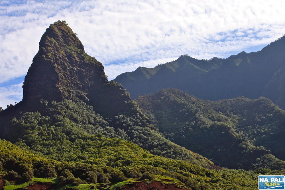 a large mountain in the background